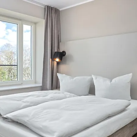 Апартаменты Strandresidenzen Strandresidenzen Haus Daenholm 4 3 *